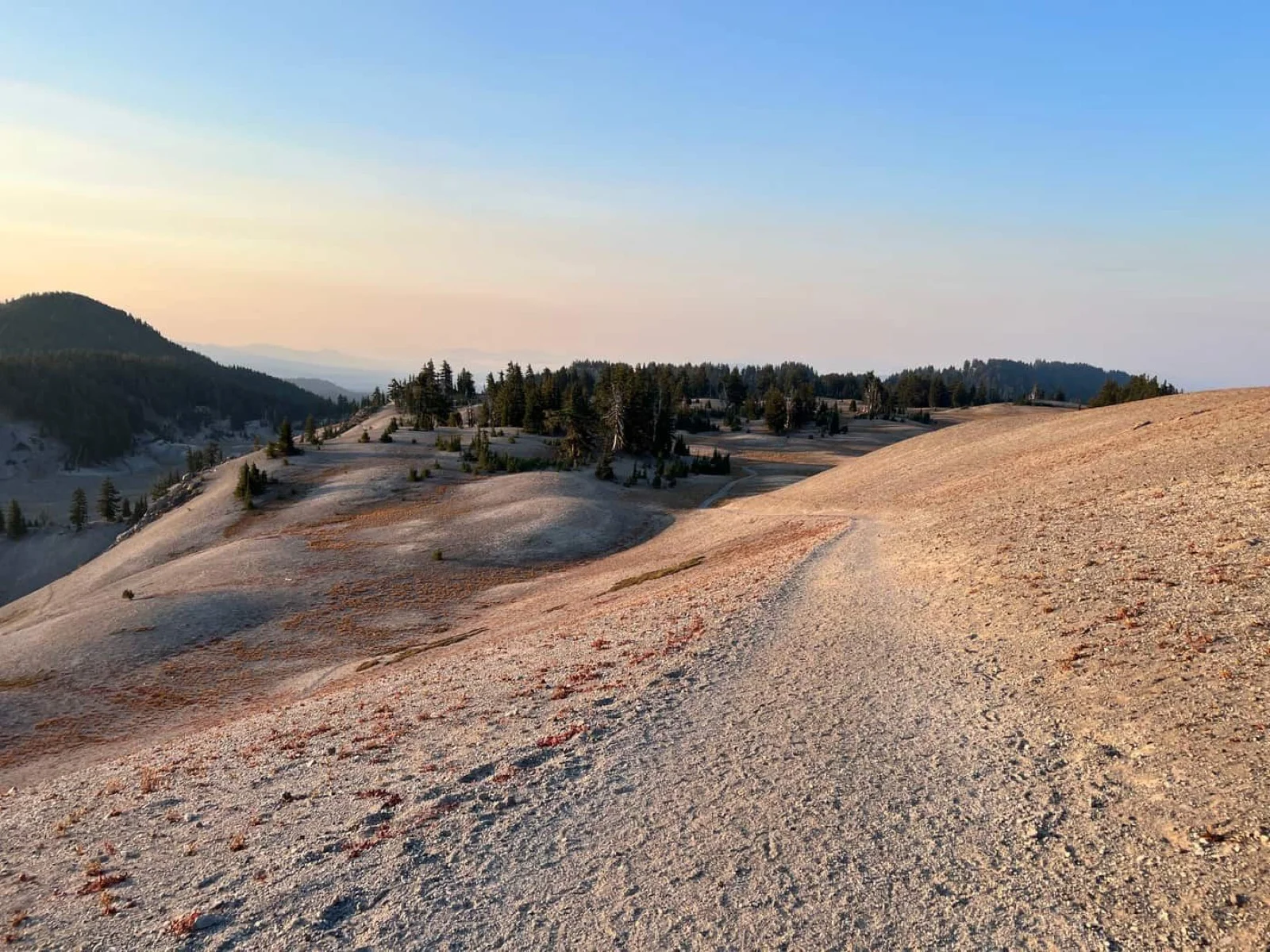 The sandy volcanic plateau on the South Sister trail at dusk, Three Sisters Wilderness, Oregon